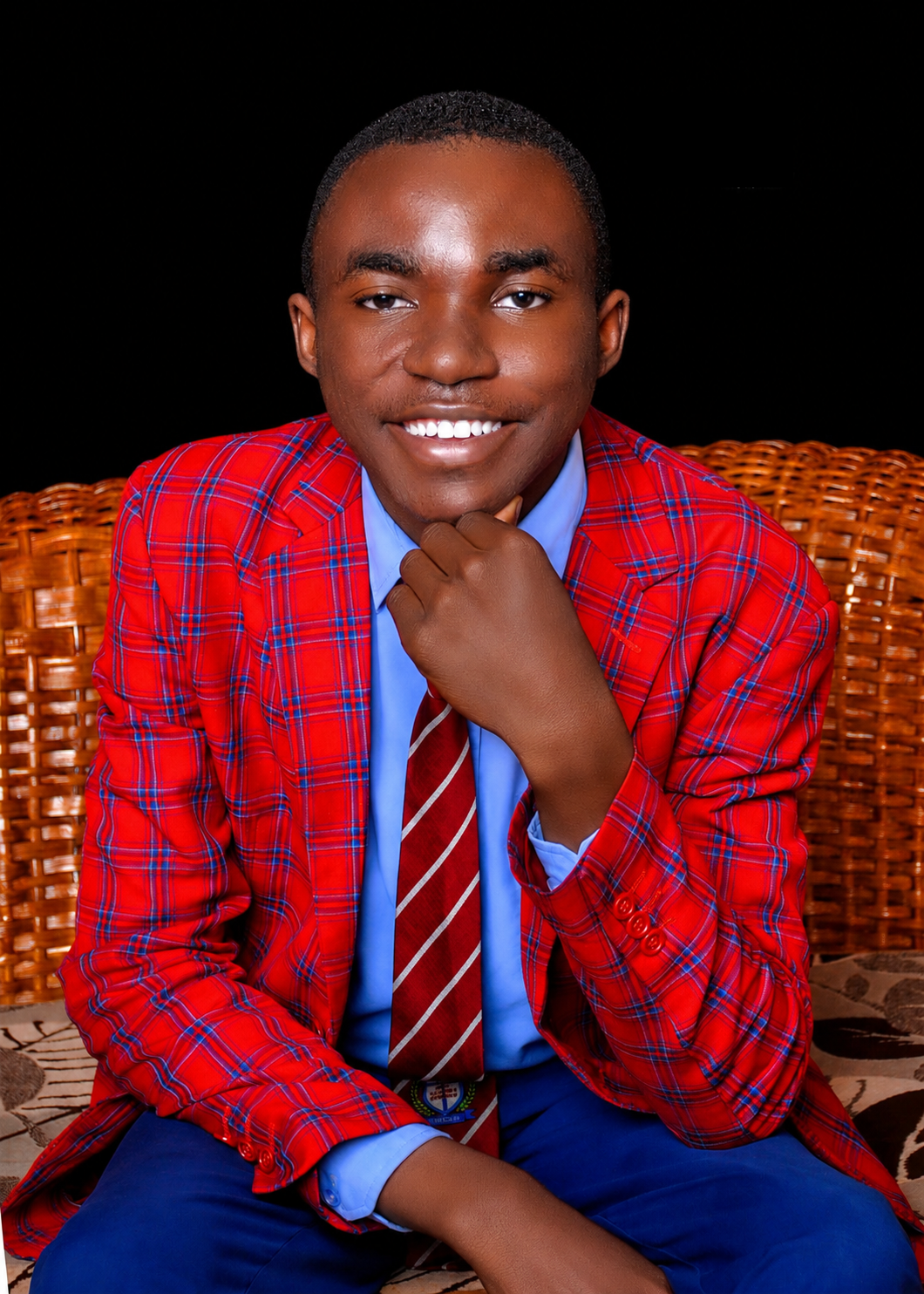 Wisdom Dabit in a red suit